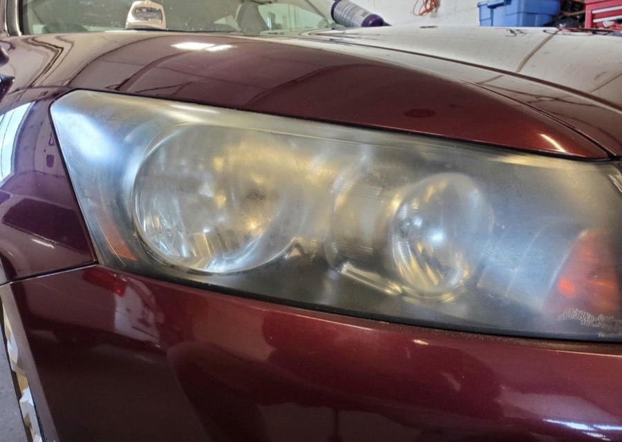 Foggy, oxidized headlight before restoration
