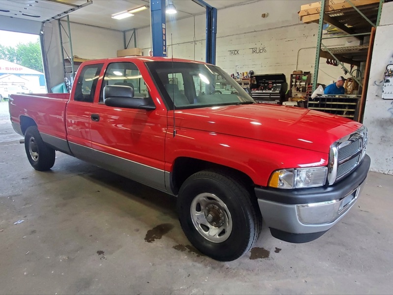 Same red Dodge Ram fully restored, clean and glossy