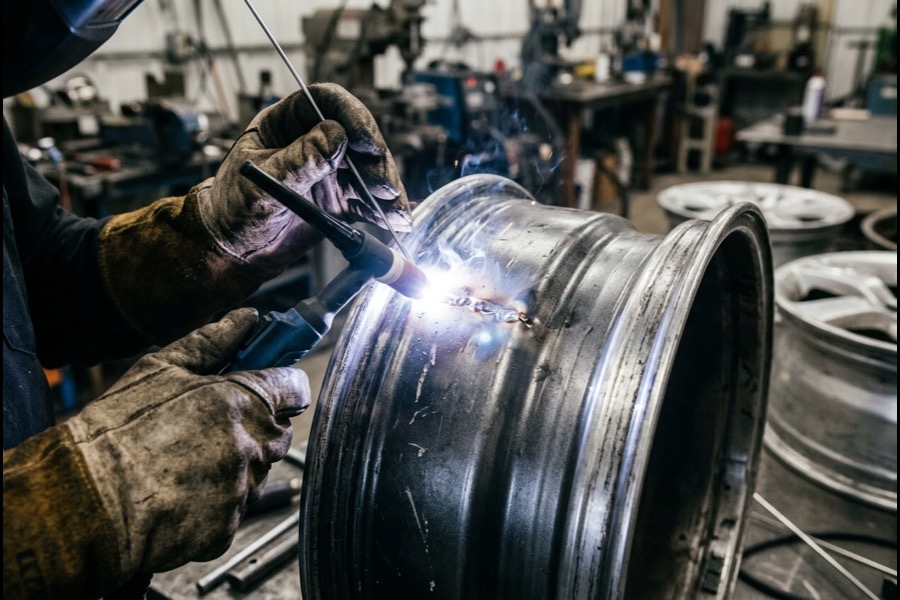 TIG welding a cracked alloy wheel in the shop