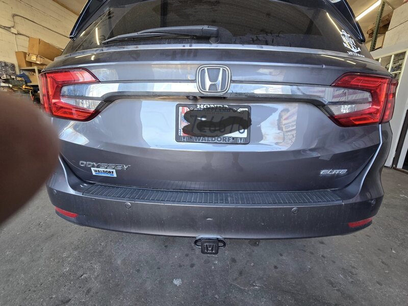 Same Odyssey tailgate smooth after paintless dent repair