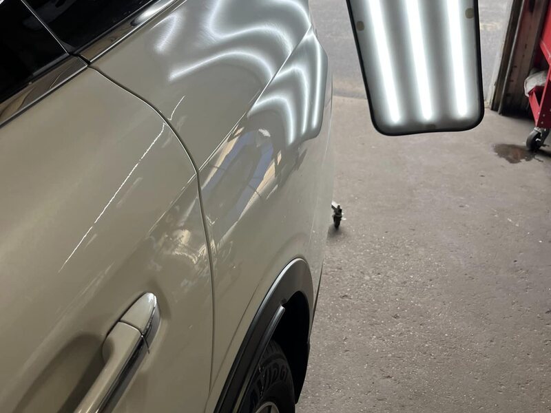 Same panel smooth after paintless dent removal