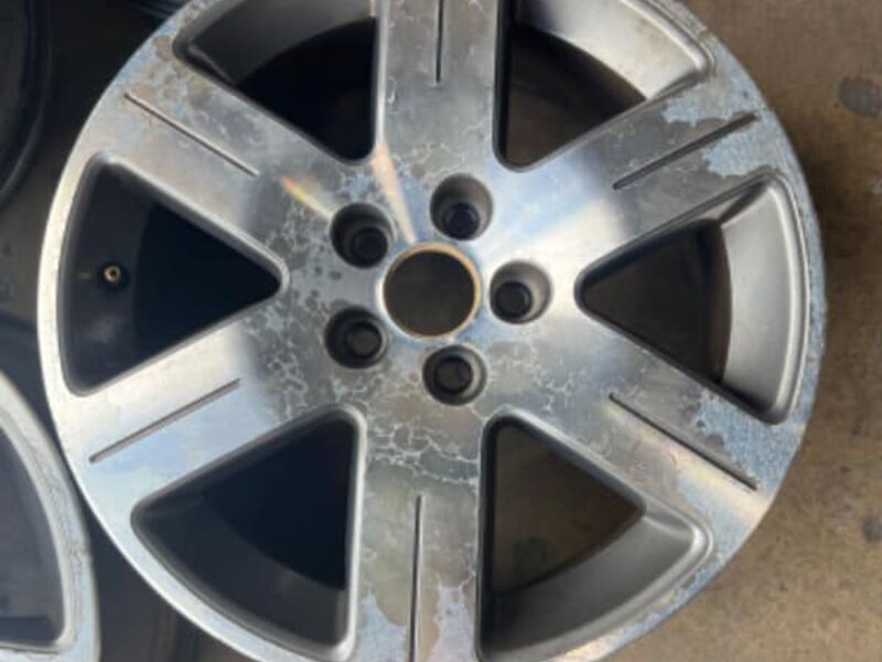 Alloy wheel with heavy corrosion and peeling clear coat